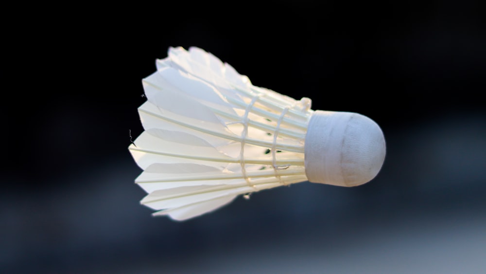 white paper lantern on black background