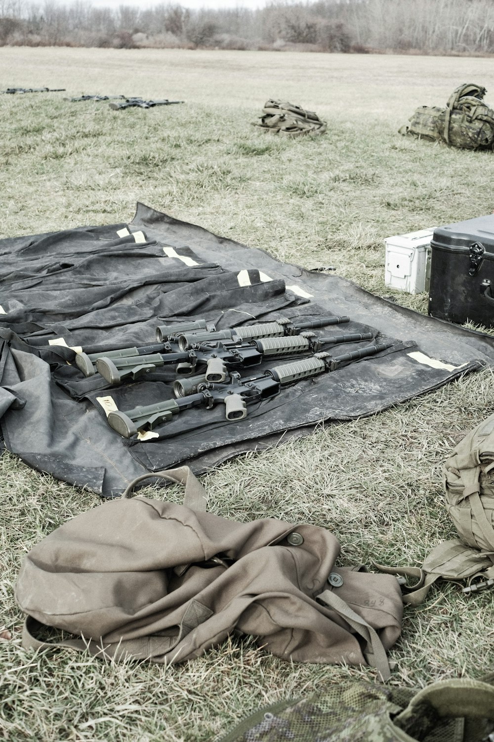 black rifle on black textile