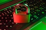red padlock on black computer keyboard