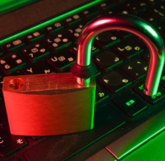 red padlock on black computer keyboard