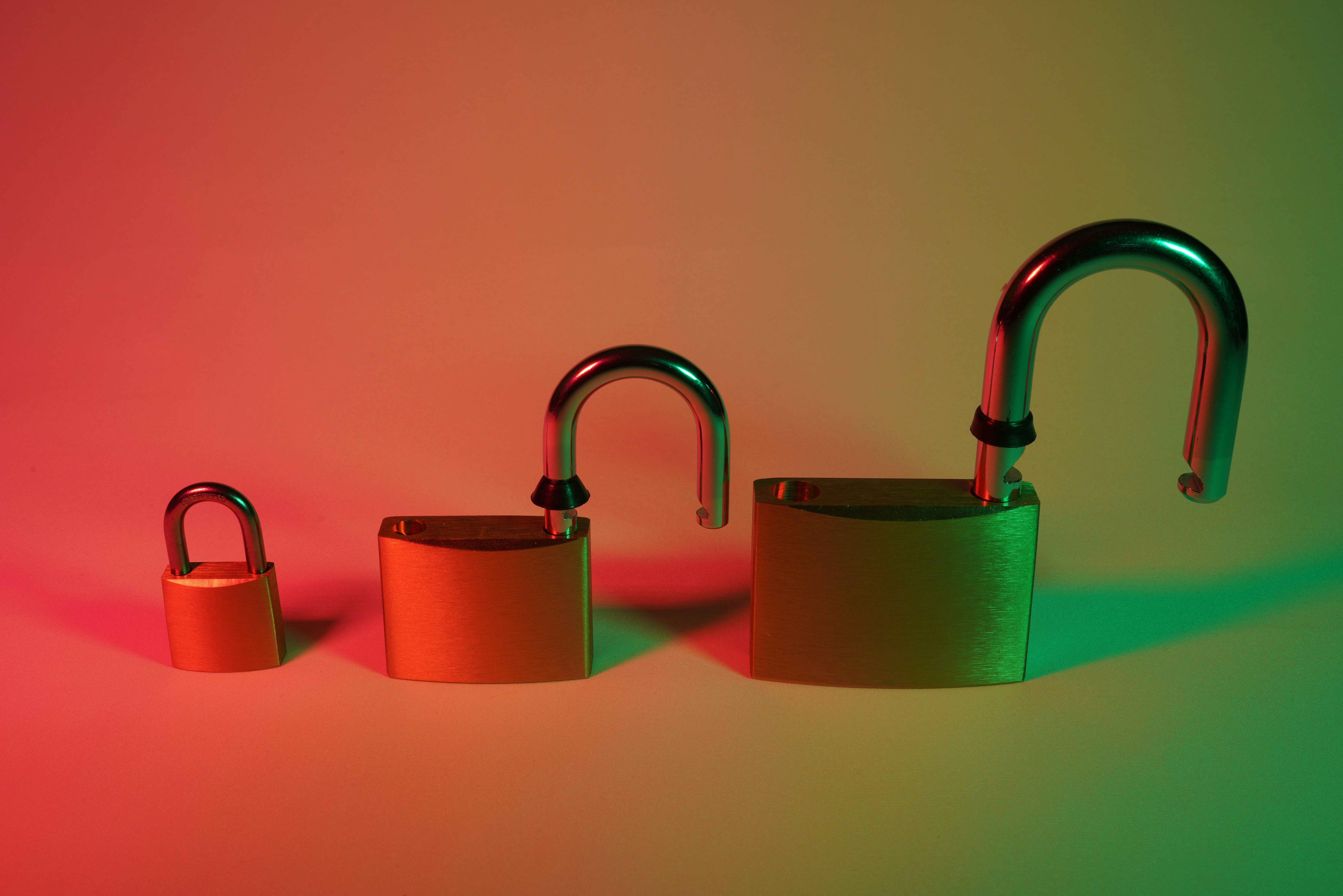 two green and silver padlock