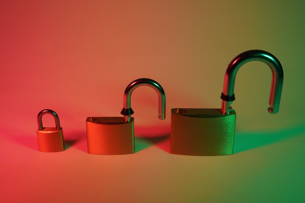 two green and silver padlock