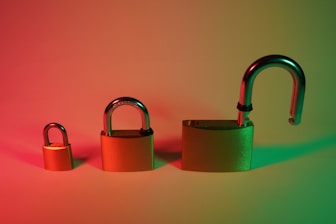 three green and brown padlock