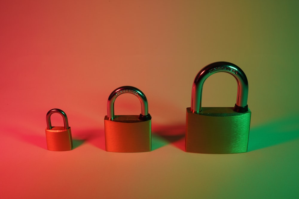 two pink padlock on pink surface