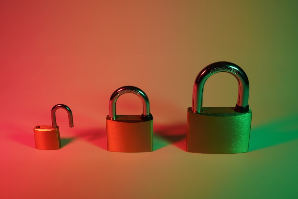 two pink padlock on pink surface