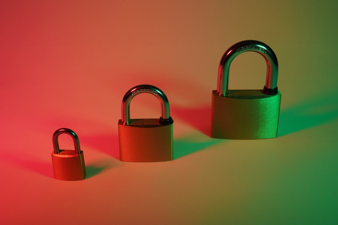 two brown padlock on pink surface