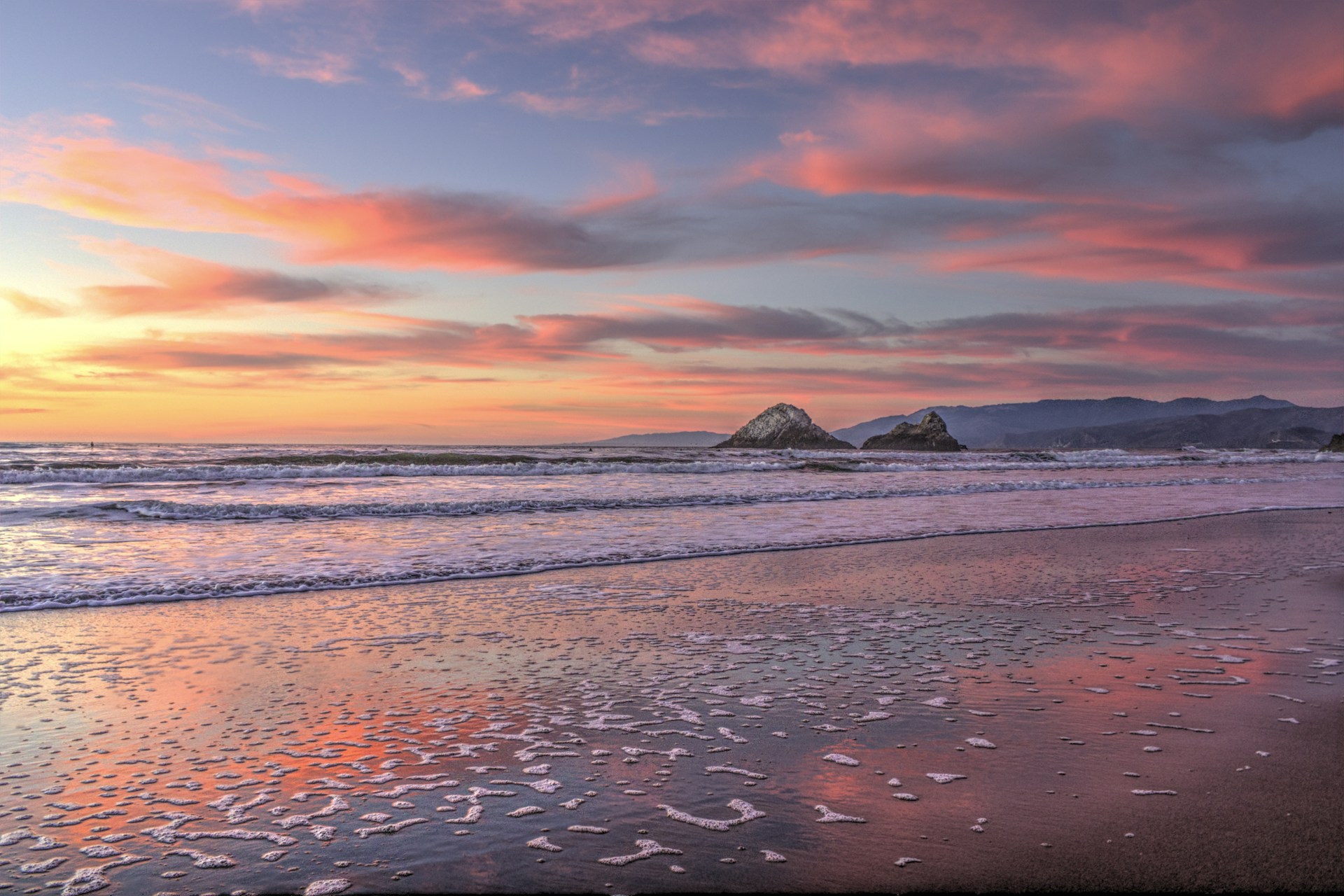 body of water during sunset