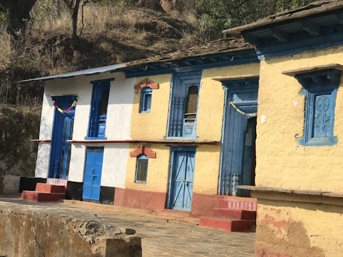 blue and yellow concrete house