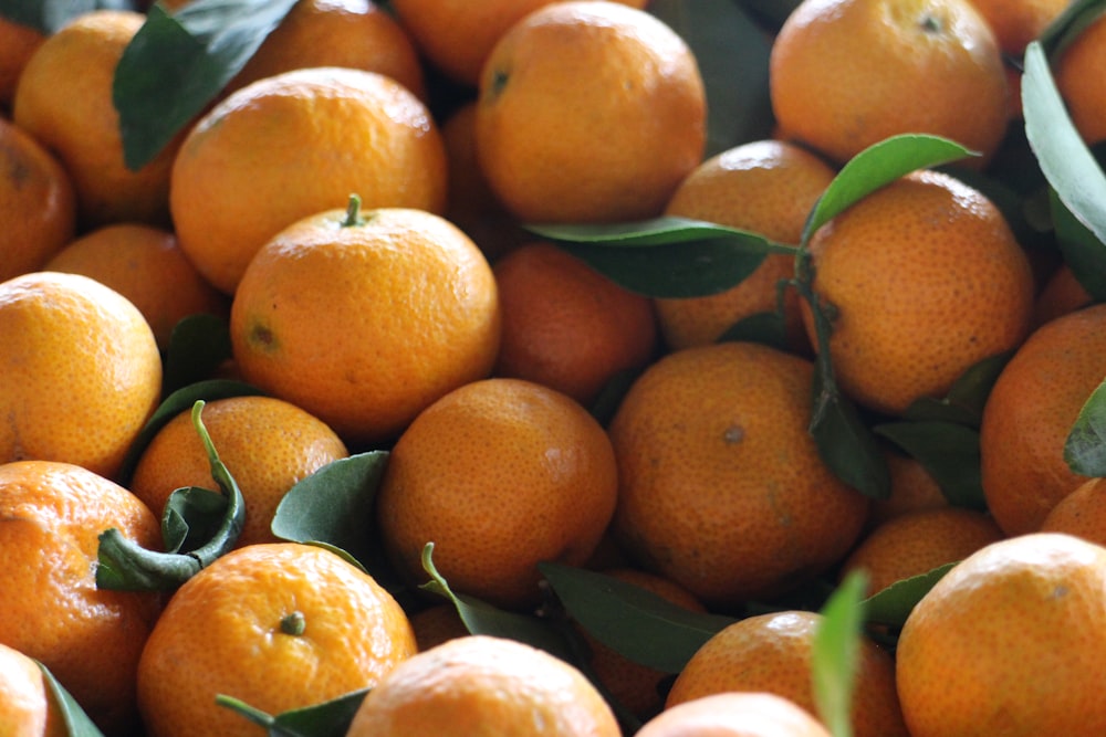 orange fruits on black tray