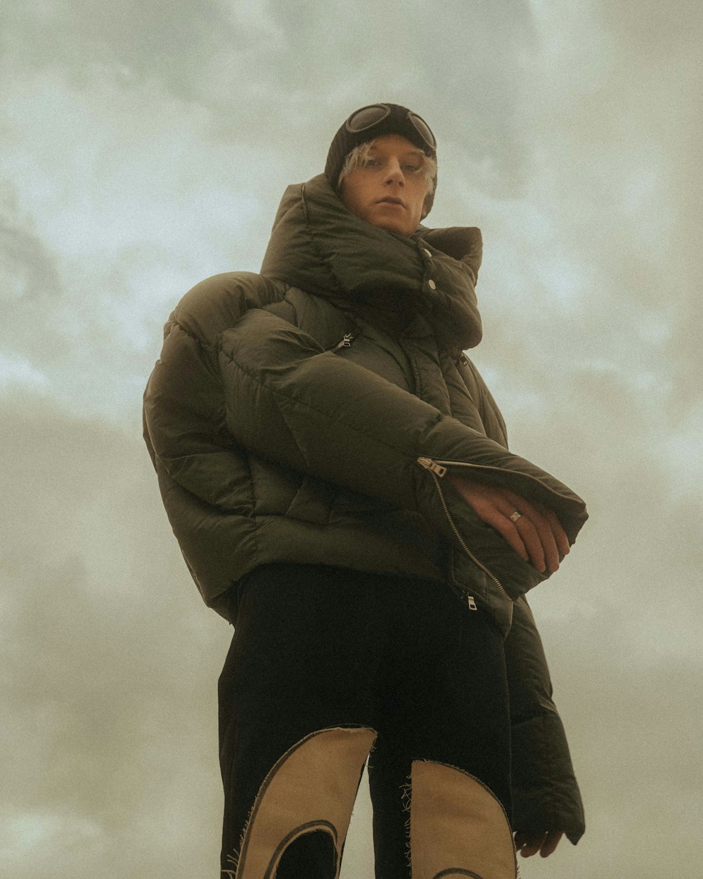 woman in gray jacket and black shorts