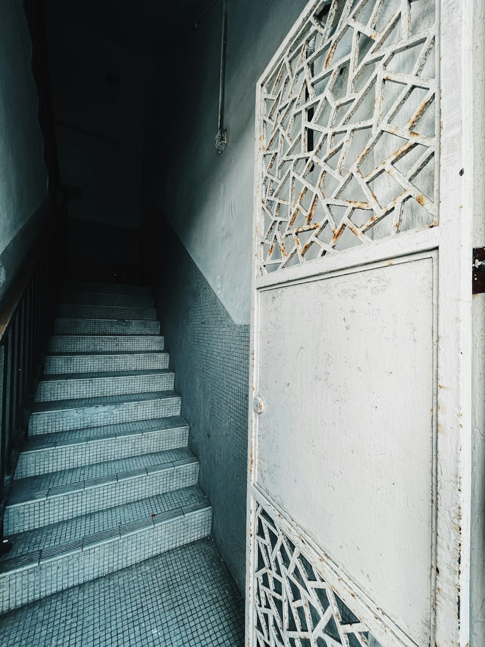 white wooden door with silver door lever