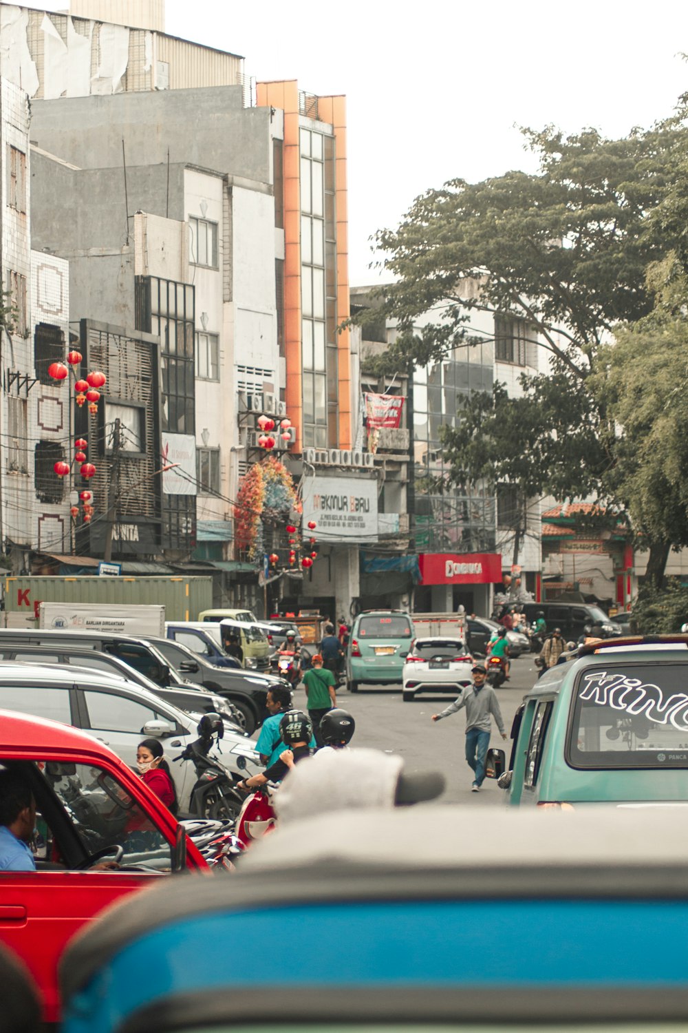 cars parked on the side of the road during daytime