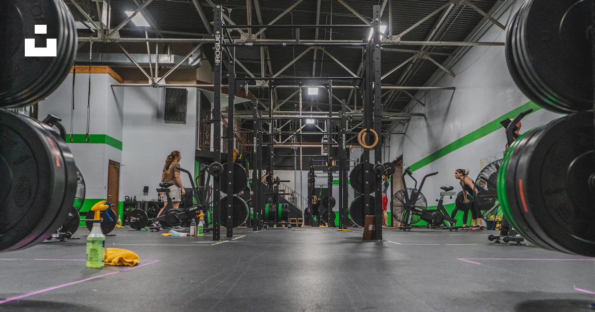 Crossfit Image A group of people doing exercises in a gym photo – Free Crossfit Image ...