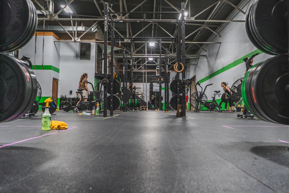 a group of people doing exercises in a gym