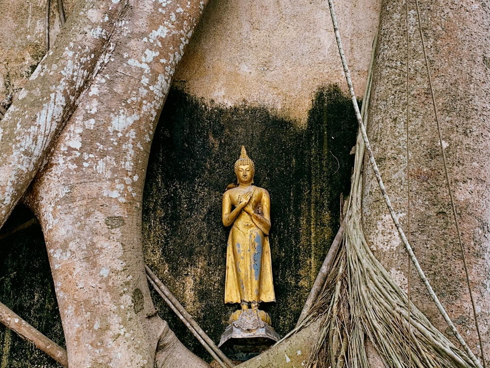 woman in yellow dress statue