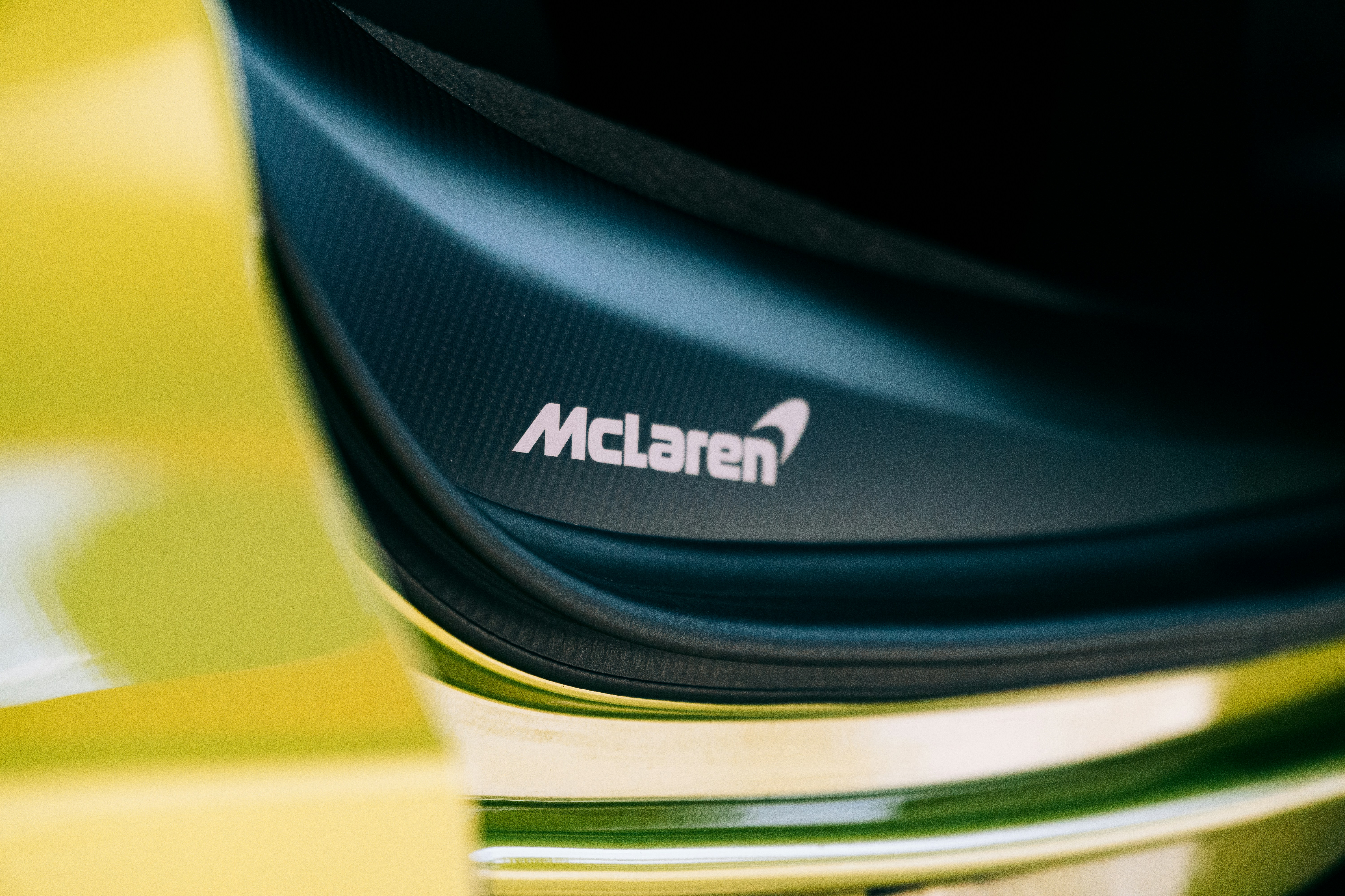 woman wearing yellow long-sleeved dress under white clouds and blue sky during daytime