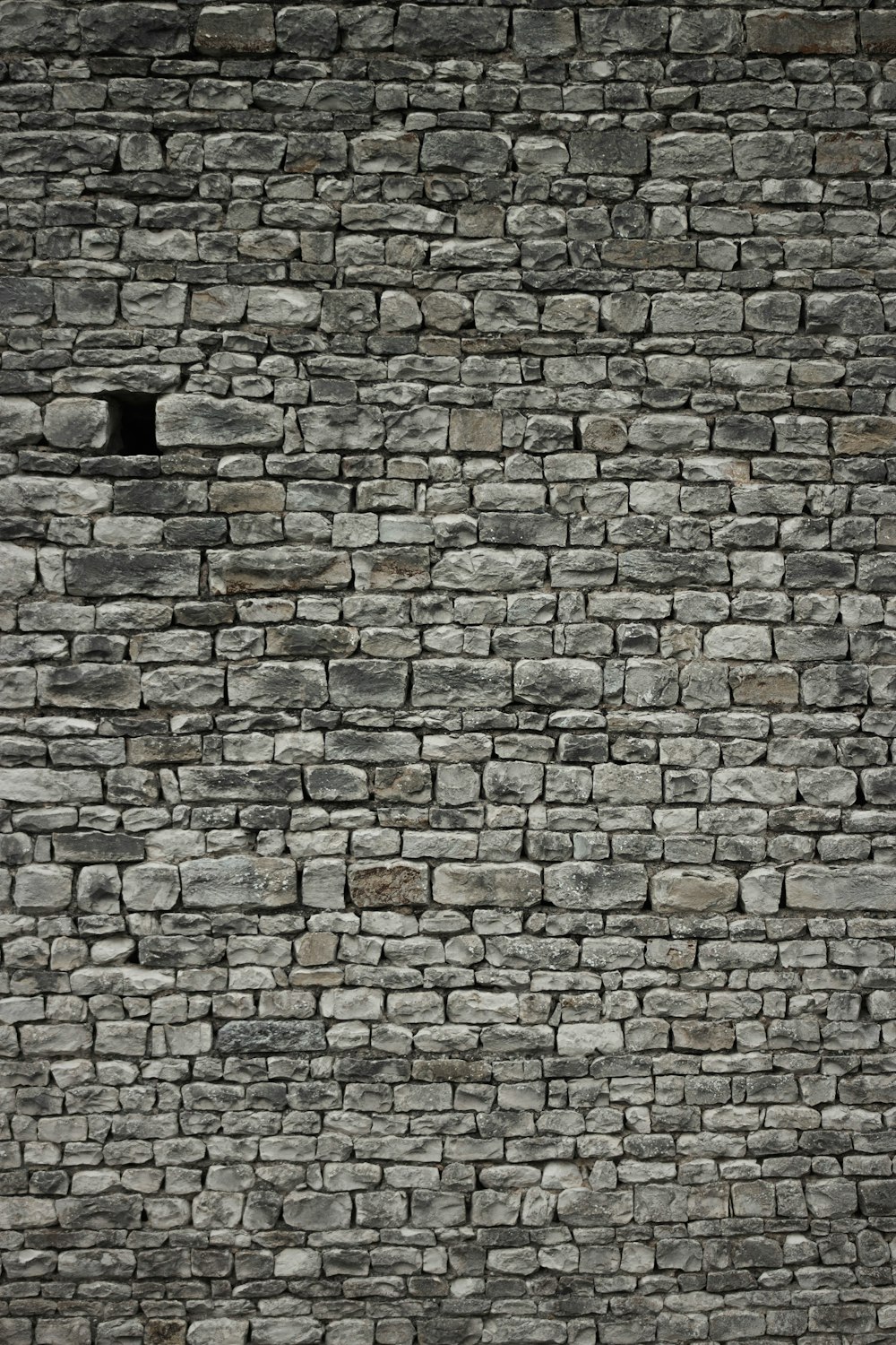 brown and grey brick wall