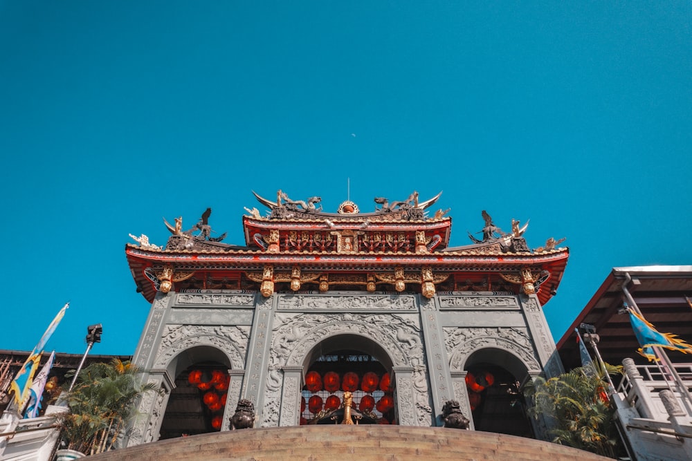 red and brown concrete building under blue sky during daytime