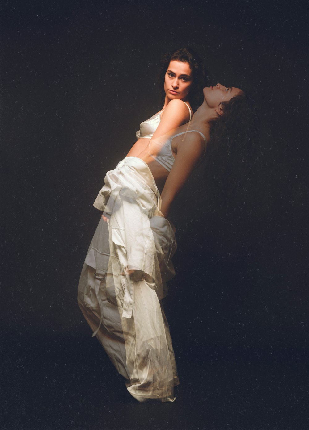 woman in white sleeveless dress