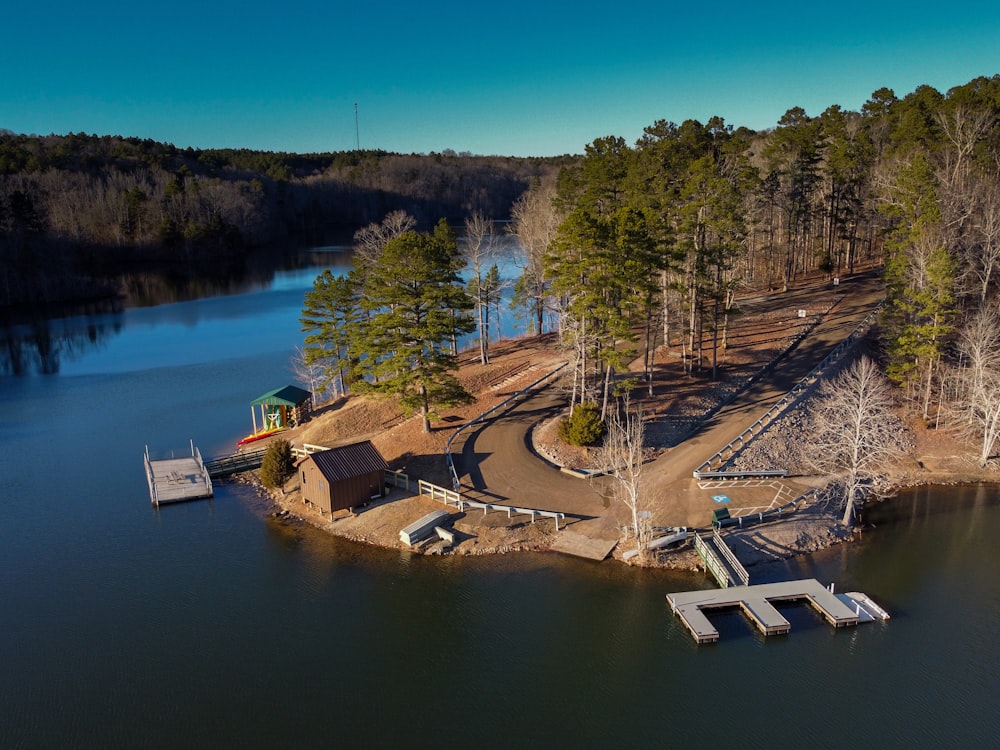 brown wooden dock on river during daytime