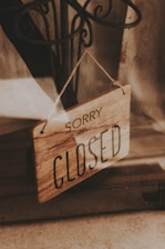 A simple under maintenance sign with a soft background.