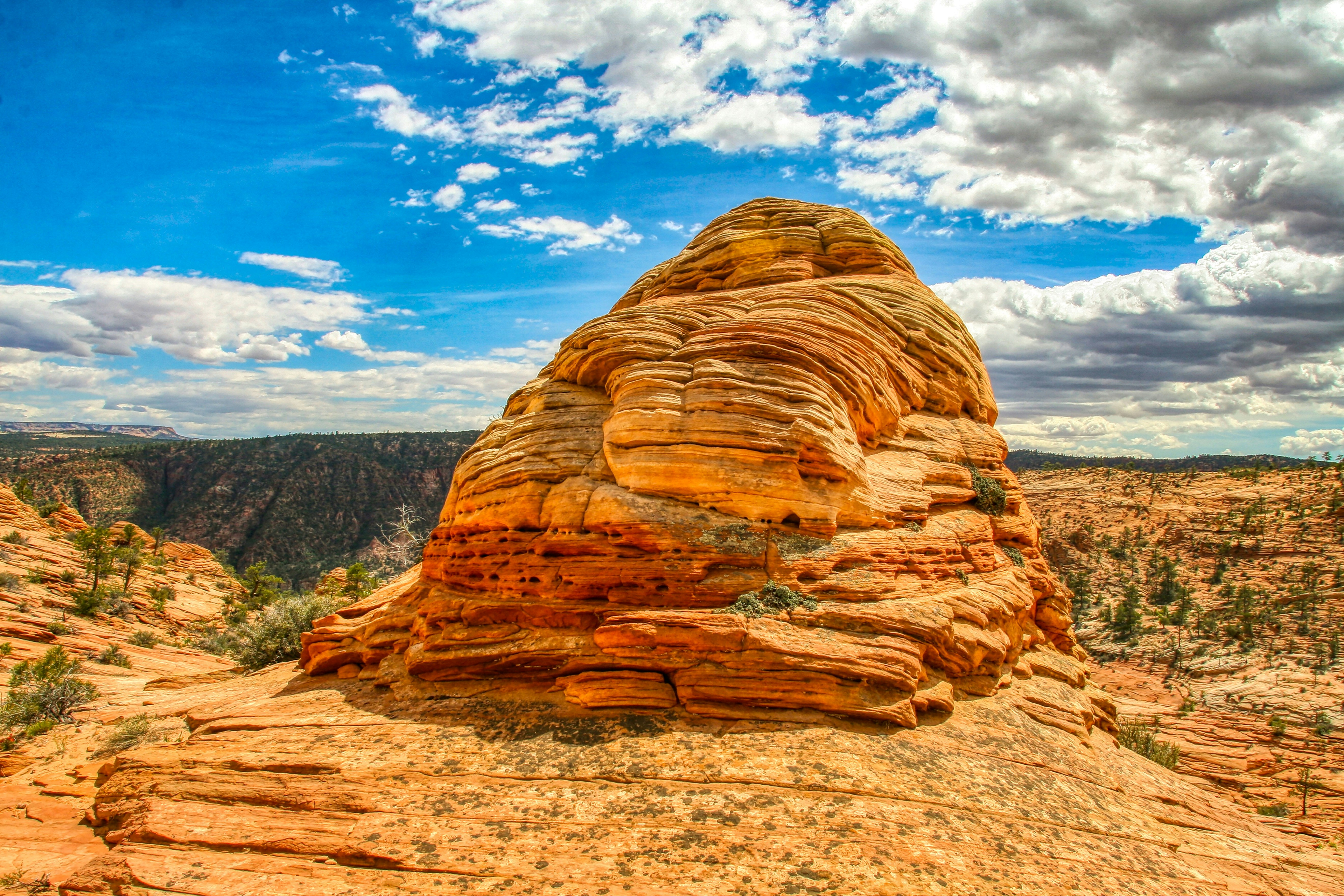 brown rock formation under blue sky during daytime