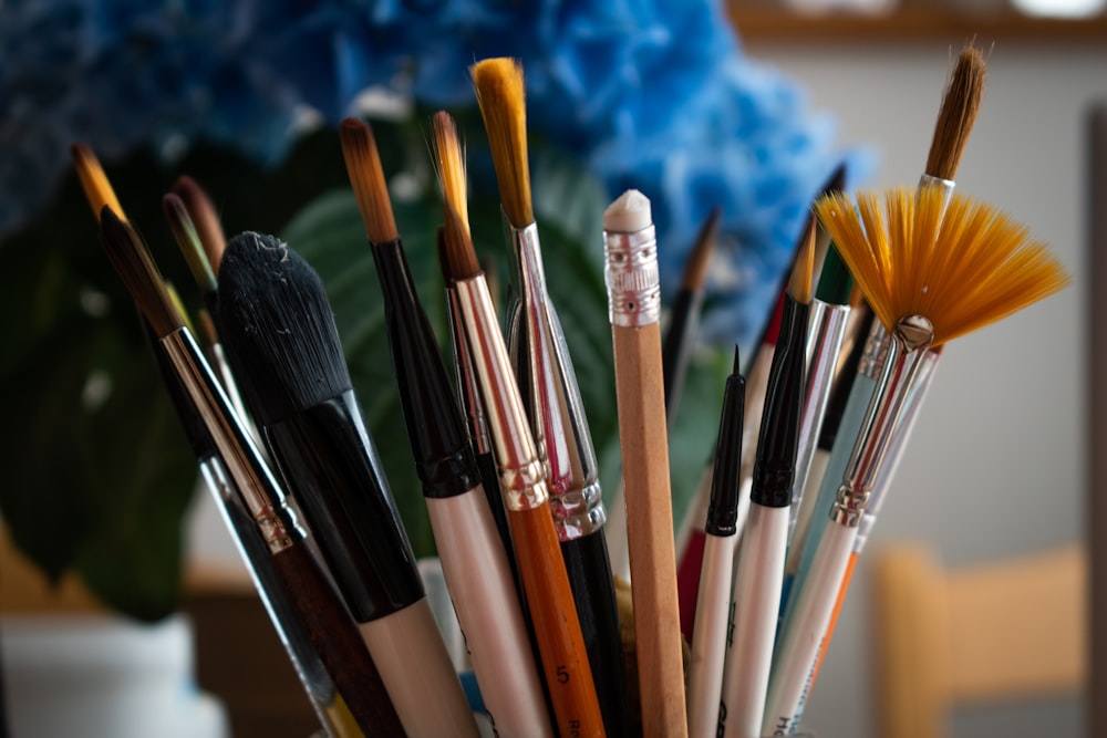 brown and black makeup brushes