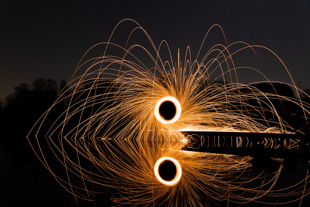 steel wool photography of fireworks during night time