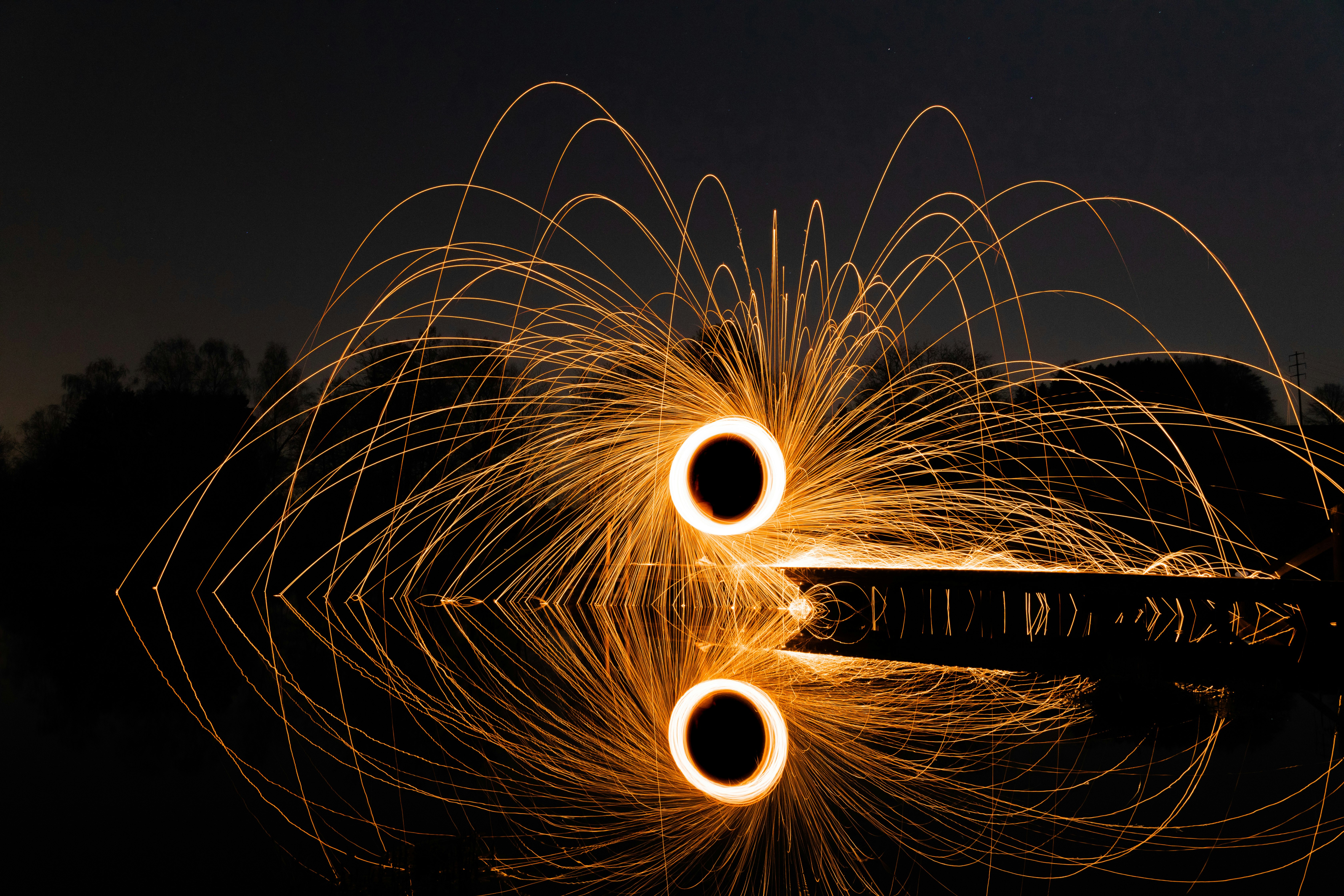 steel wool photography of fireworks during night time