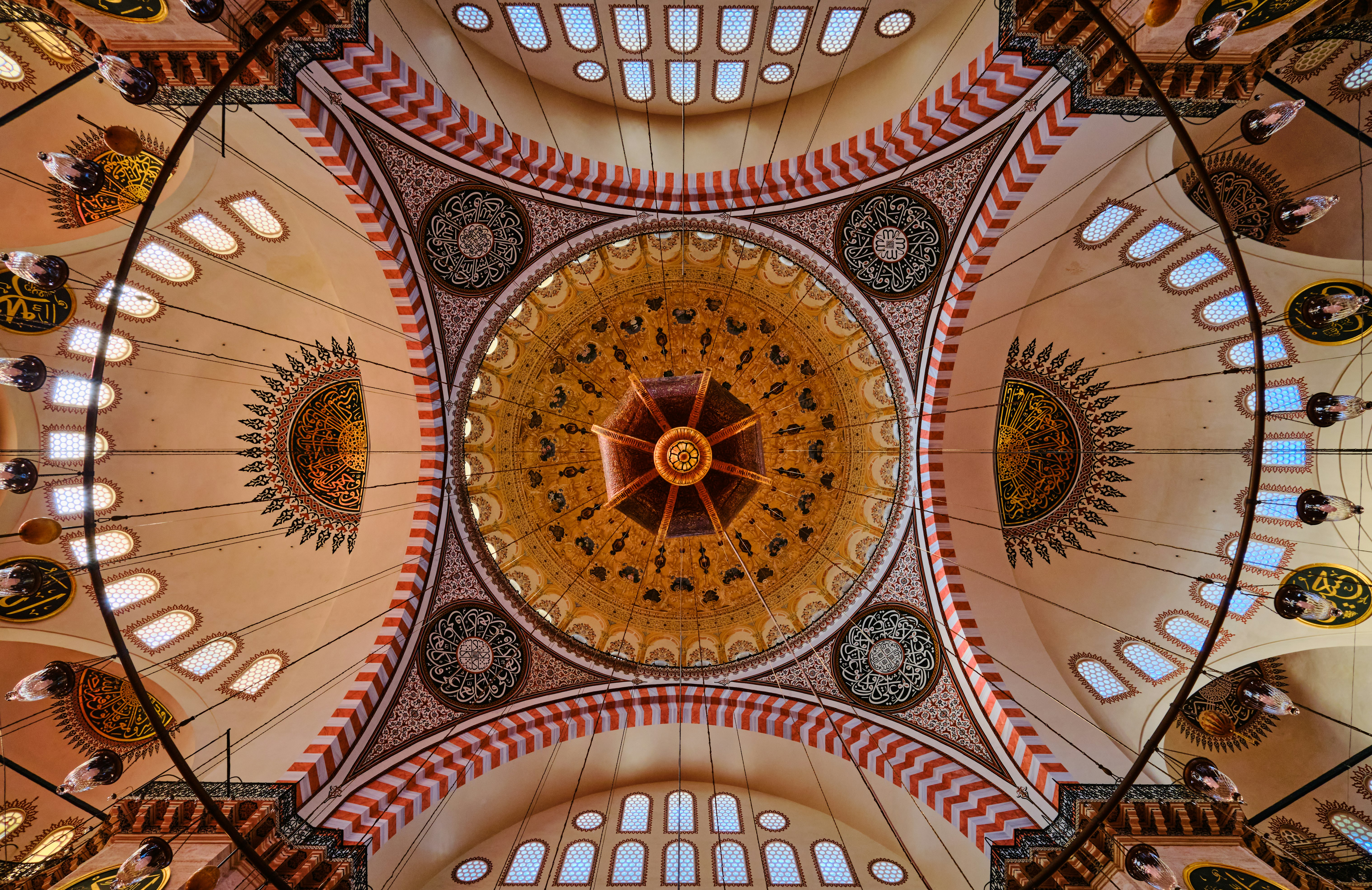 brown and white ceiling with glass windows