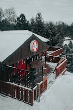 A snowy Alaskan landscape with a small medical clinic nestled among trees