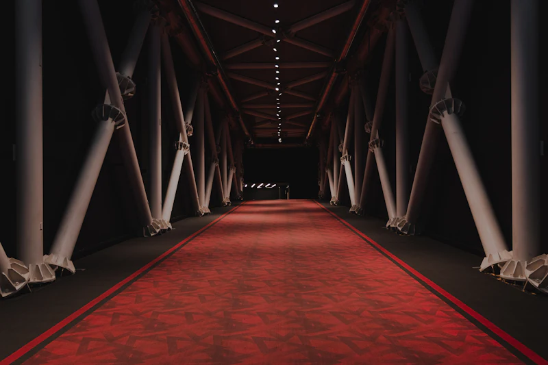 Red and brown hallway with white lights