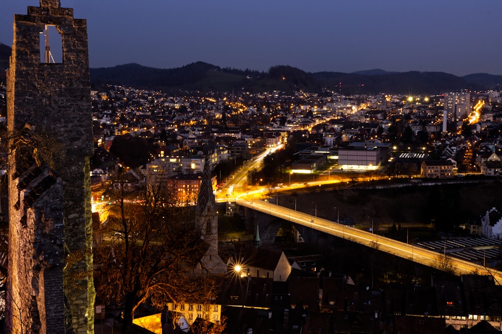 city with high rise buildings during night time