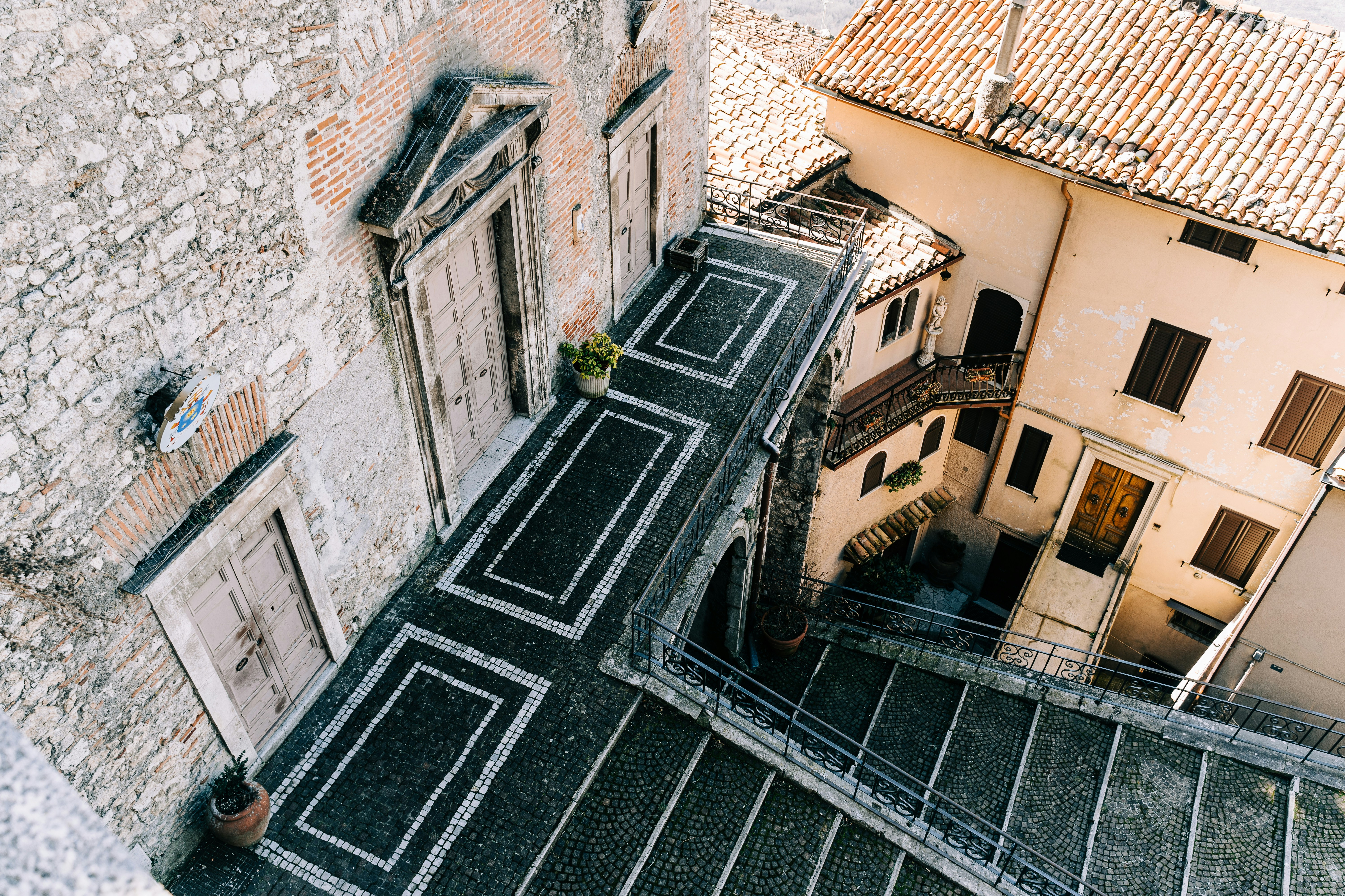 Steps leading down to a Medieval church in Cervara di Roma, Lazio, Italy
