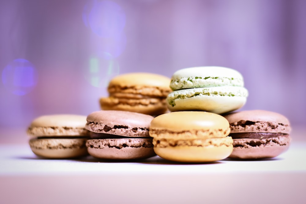 brown and green cookies on white ceramic plate