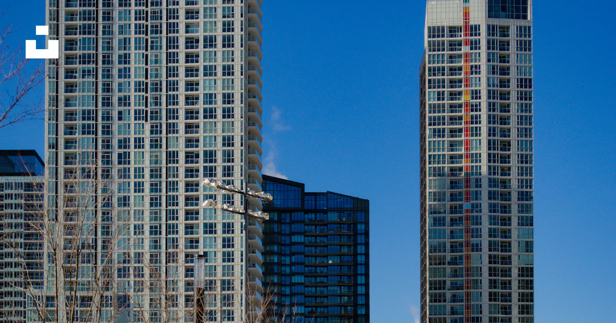 White and blue high rise building photo – Free City Image on Unsplash