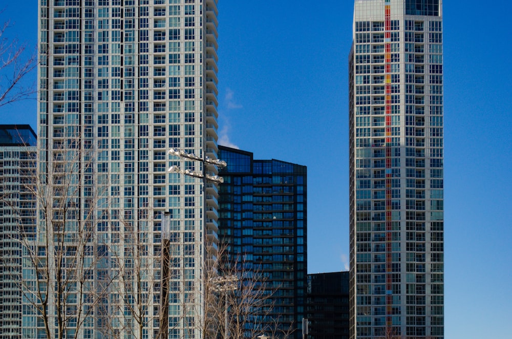 white and blue high rise building