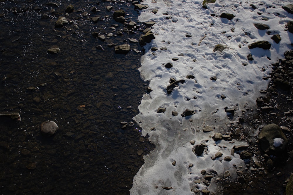 white ice on black sand