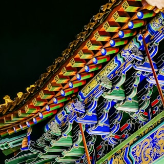 A close-up shot of intricate details in Asian-inspired artwork
