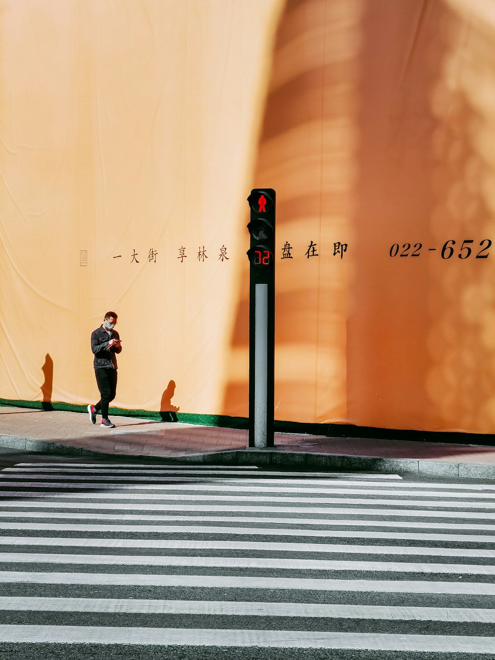 2 women walking on pedestrian lane