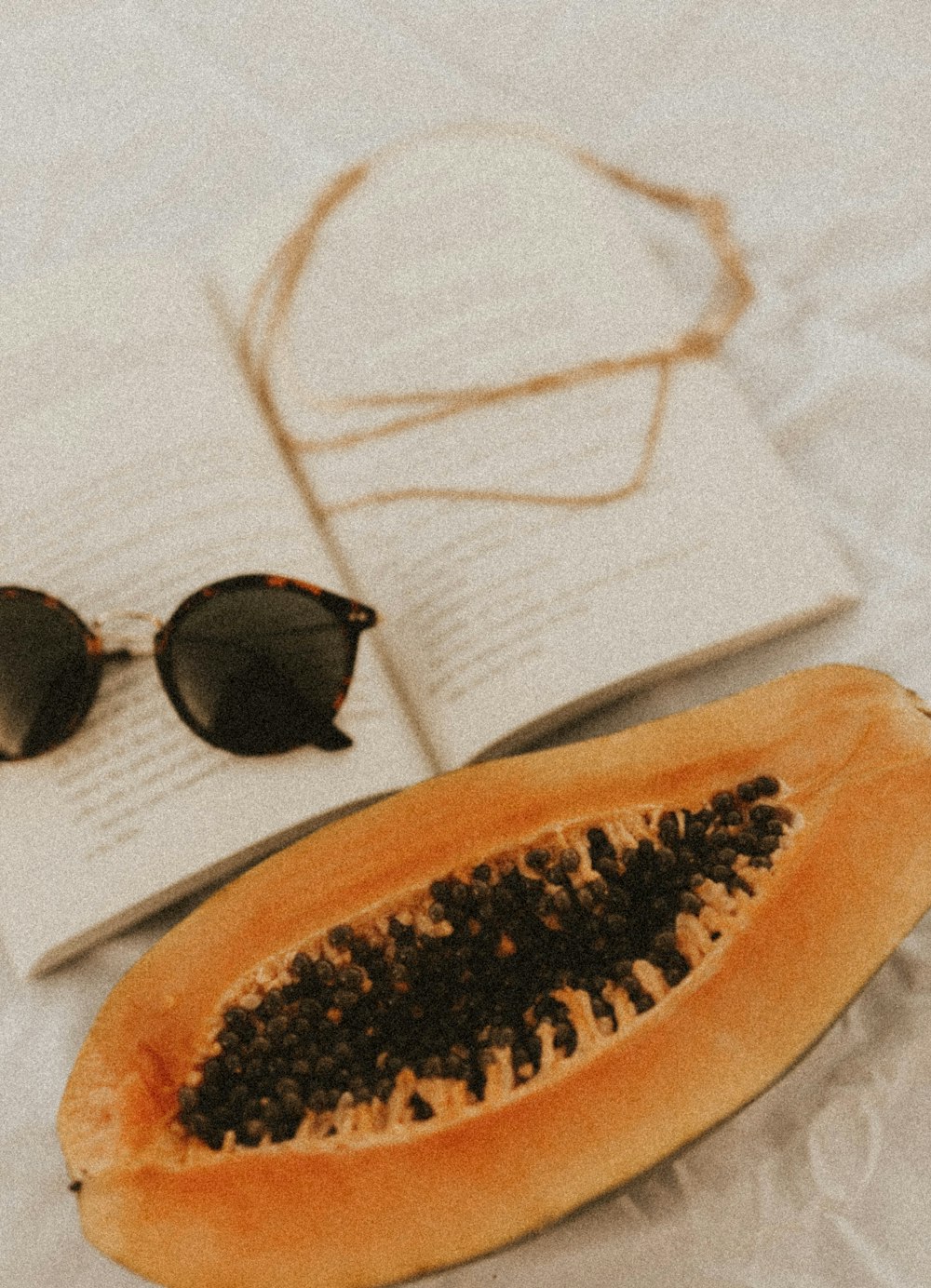 black sunglasses on white paper