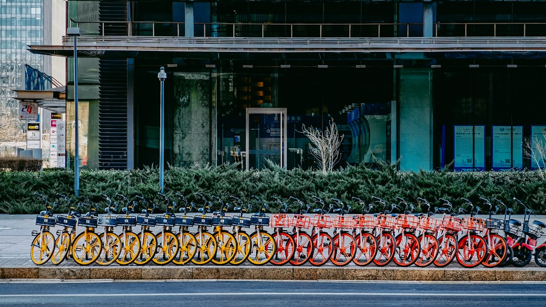 red and yellow plastic pots on street during daytime