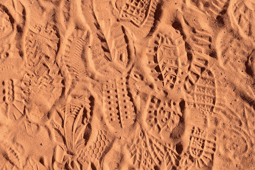 brown sand with heart shaped print