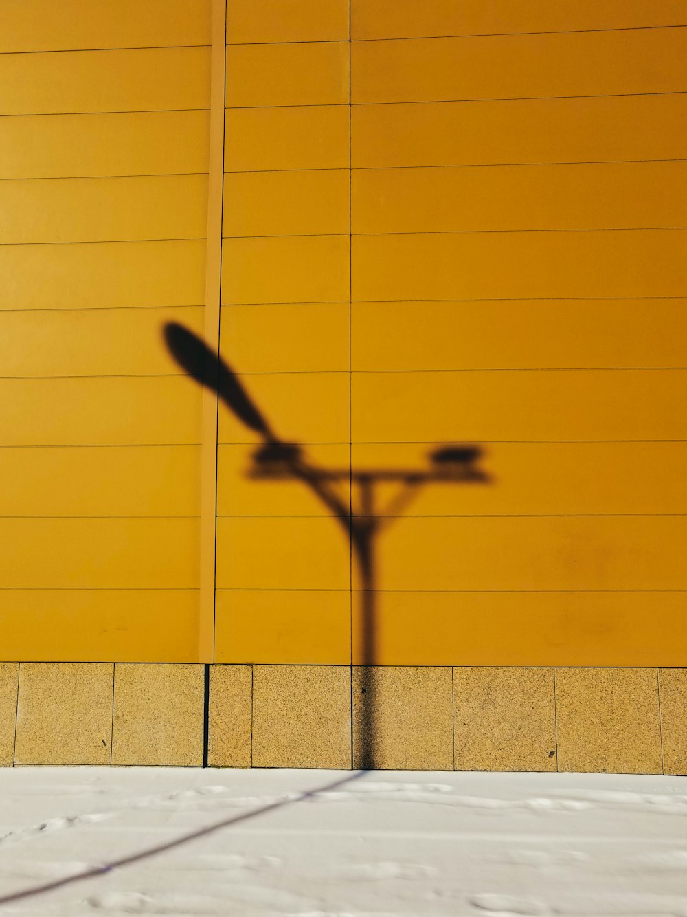 yellow and white concrete wall