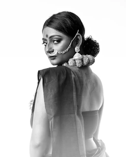 A candid portrait of a young Réunionnais woman reflecting modern cultural identity with subtle traditional elements.