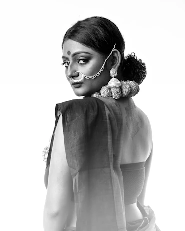 A candid portrait of a young Réunionnais woman reflecting modern cultural identity with subtle traditional elements.