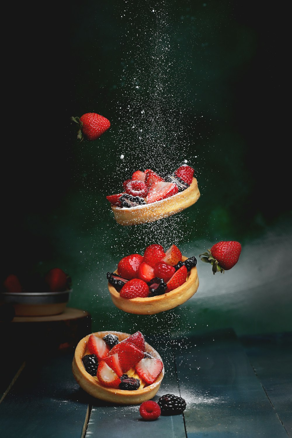 strawberries on brown wooden bowl