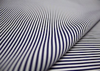 white and black striped textile