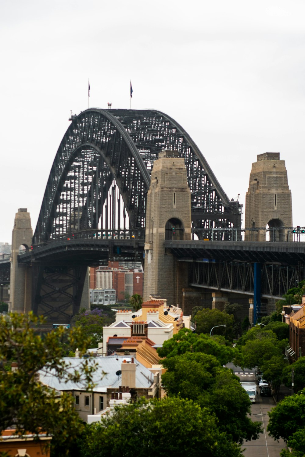 gray concrete bridge under gray sky during daytime