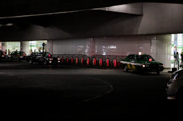 Modern taxi fleet lined up ready for airport transfers at dawn.